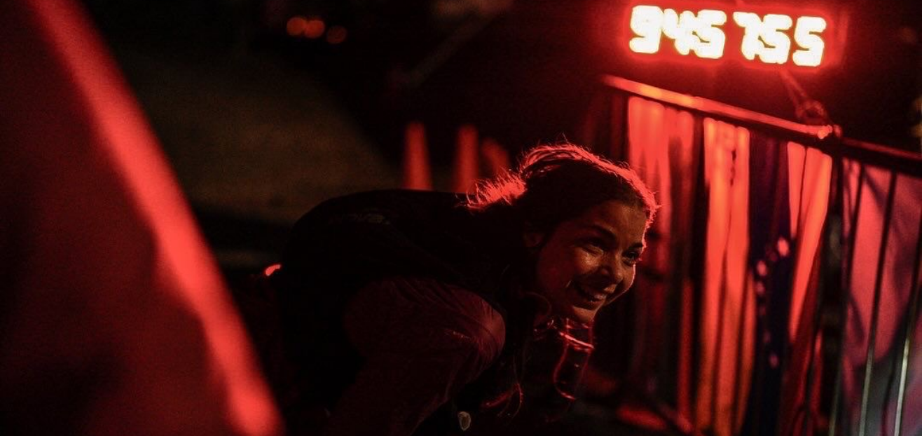 INOV8 Athlete Sarah Perry finishing her penultimate lap