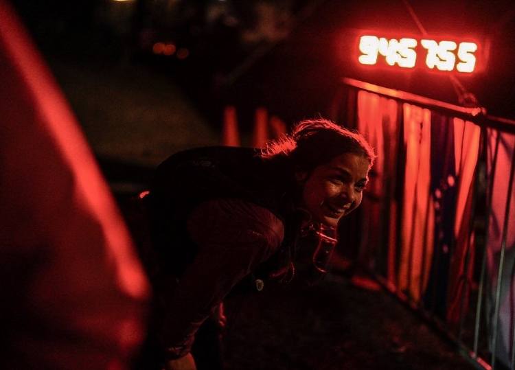 INOV8 Athlete Sarah Perry finishing her penultimate lap