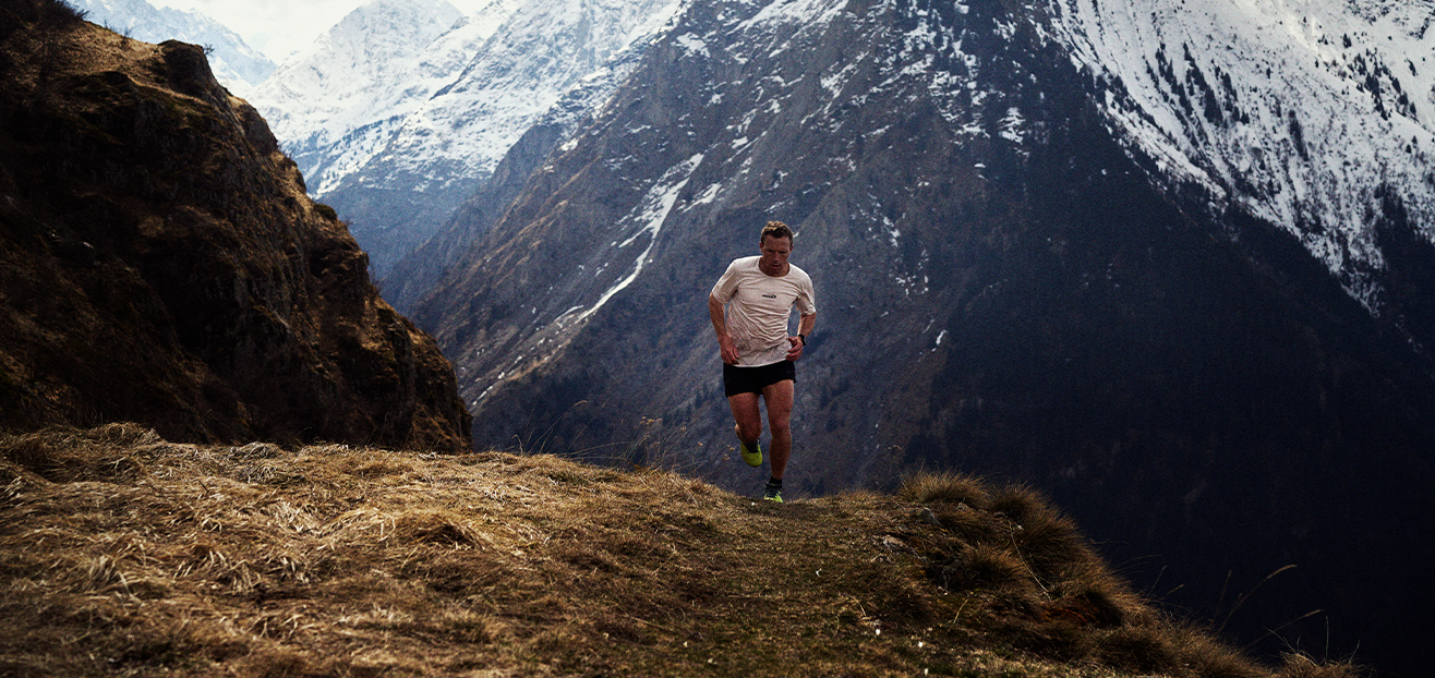 INOV8 athlete Yannick Noël running in Les Deux-Alpes.