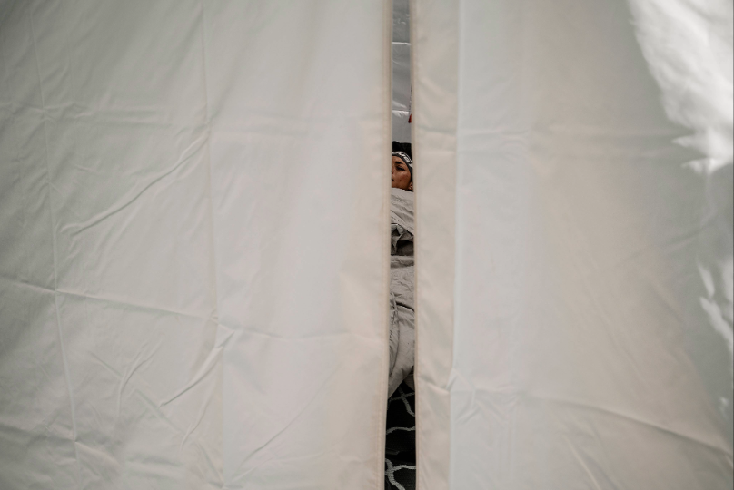 Sarah Perry resting in her support tent at Legends Backyard Ultra 2026