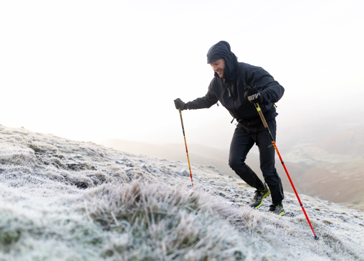 James Gibson running up a frosty hillside