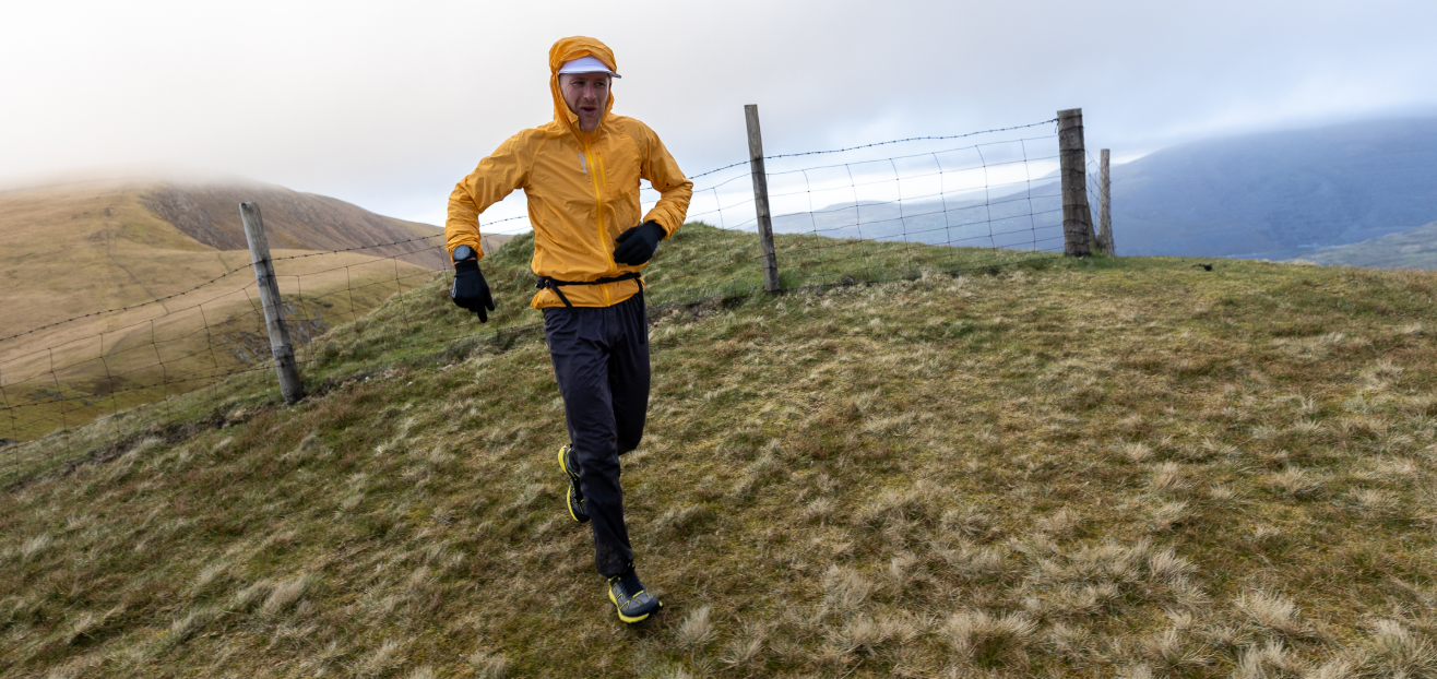 James Gibson running up a frosty hillside