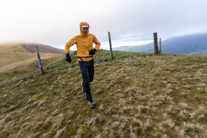 James Gibson running up a frosty hillside