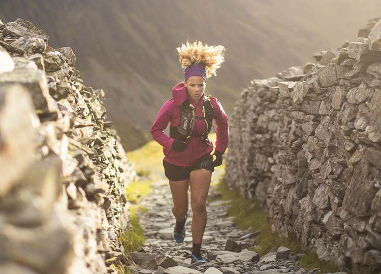 Sabrina Pace-Humphreys running on a trail