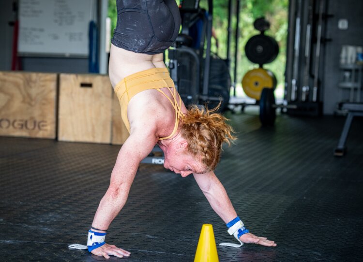 Shelby Neil doing a hand stand