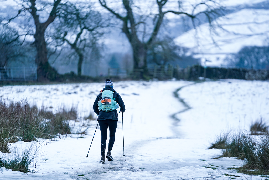 INOV8 athlete Laura Swanton-Rouvelin running the Winter Spine Race in 2025.
