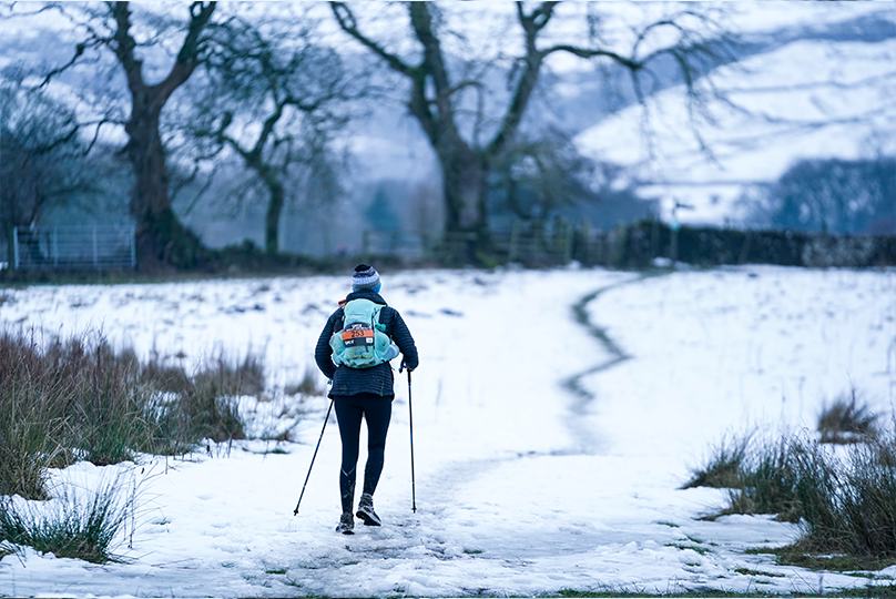 INOV8 athlete Laura Swanton-Rouvelin running the Winter Spine Race in 2025.