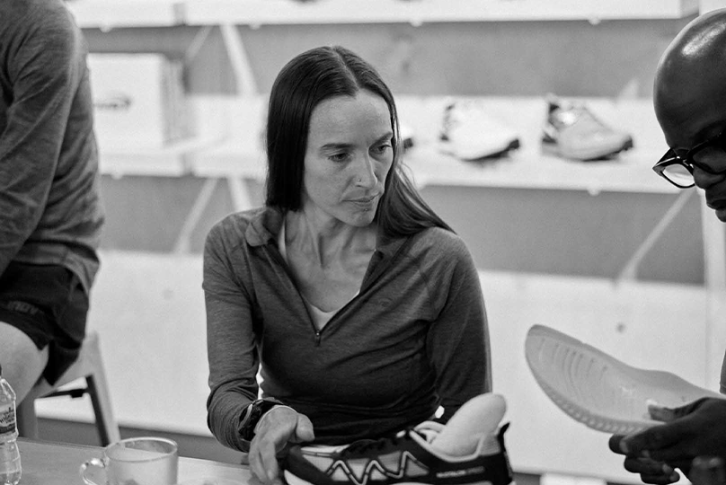 Laura Swanton-Rouvelin analysing new INOV8 footwear.