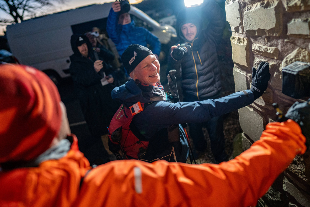 Touching the wall at The Border Hotel, the finish line of the Challenger North. Photo by Will Roberts for Spine Race.