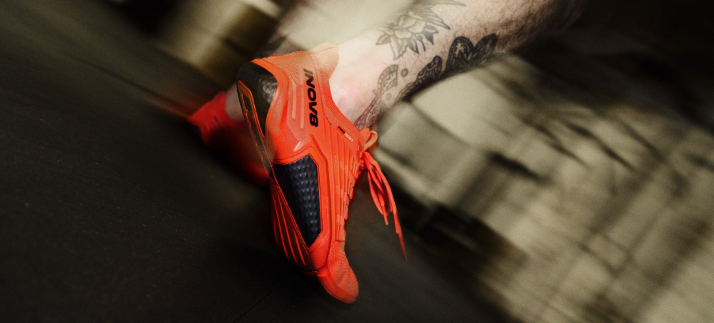 BARE-XF PRO barefoot shoe in a bold orange colour