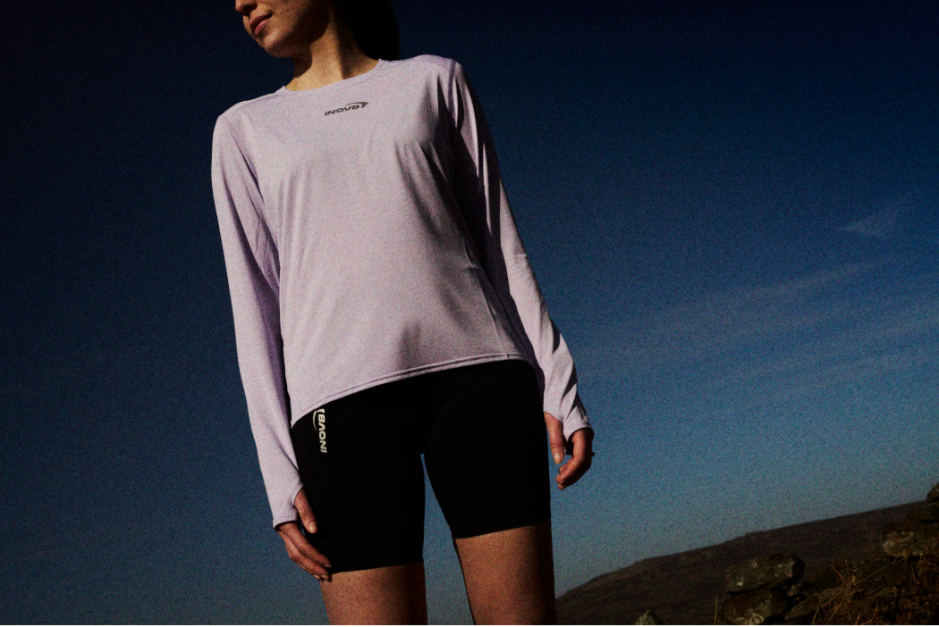 Hiker wearing the Airlite Pro Long Sleeve T-Shirt