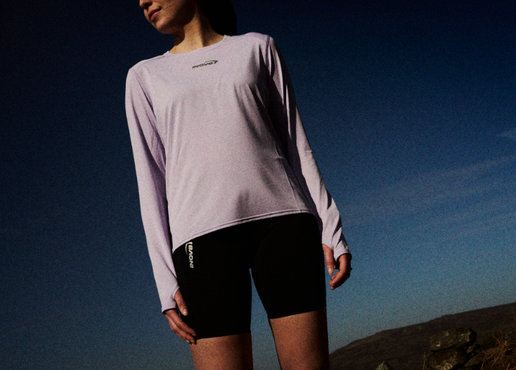 Hiker wearing the Airlite Pro Long Sleeve T-Shirt