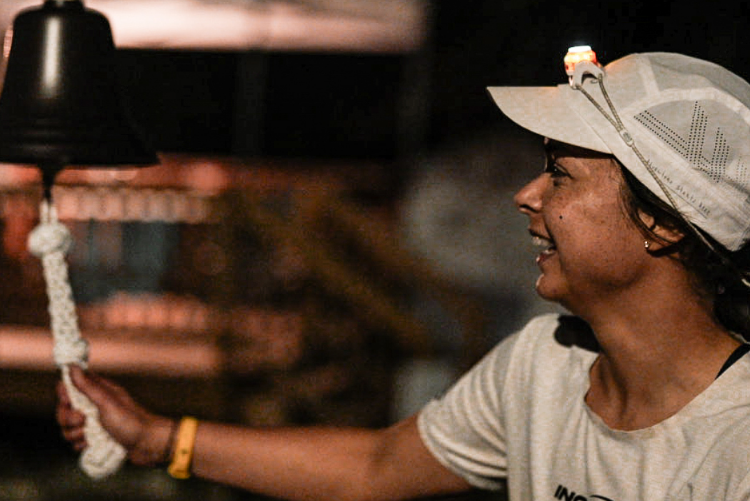 Sarah Perry ringing a bell to signify beating a world record