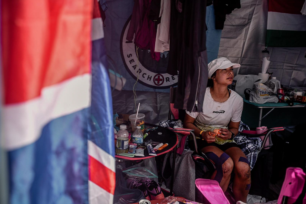 INOV8 Athlete Sarah Perry taking a short rest in her tent inbetween laps