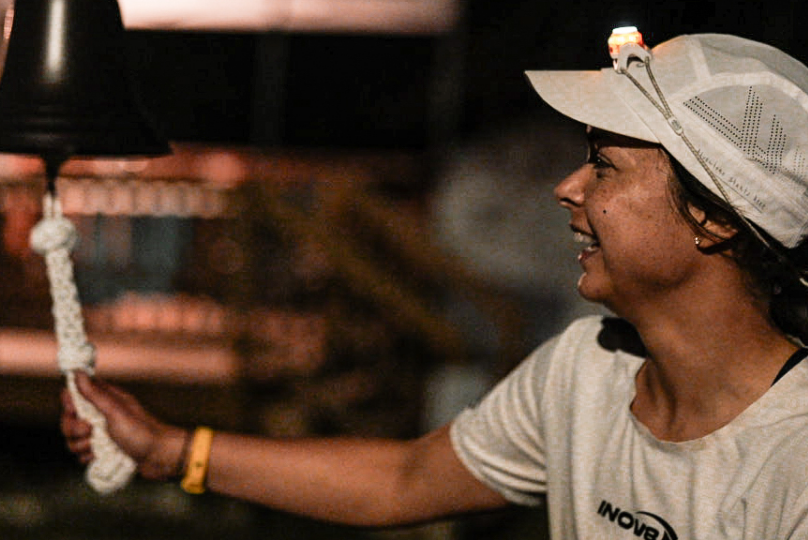 Sarah Perry ringing a bell to signify beating a world record